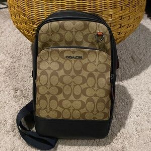 Coach sling pack in signature brown and tan